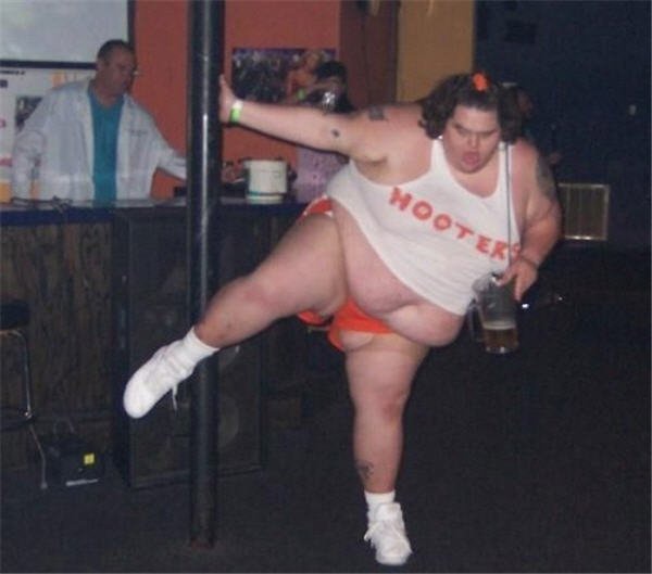 fat_girl_in_hooters_uniform_pole_dances_with_pitcher_of_beer-98644.jpg